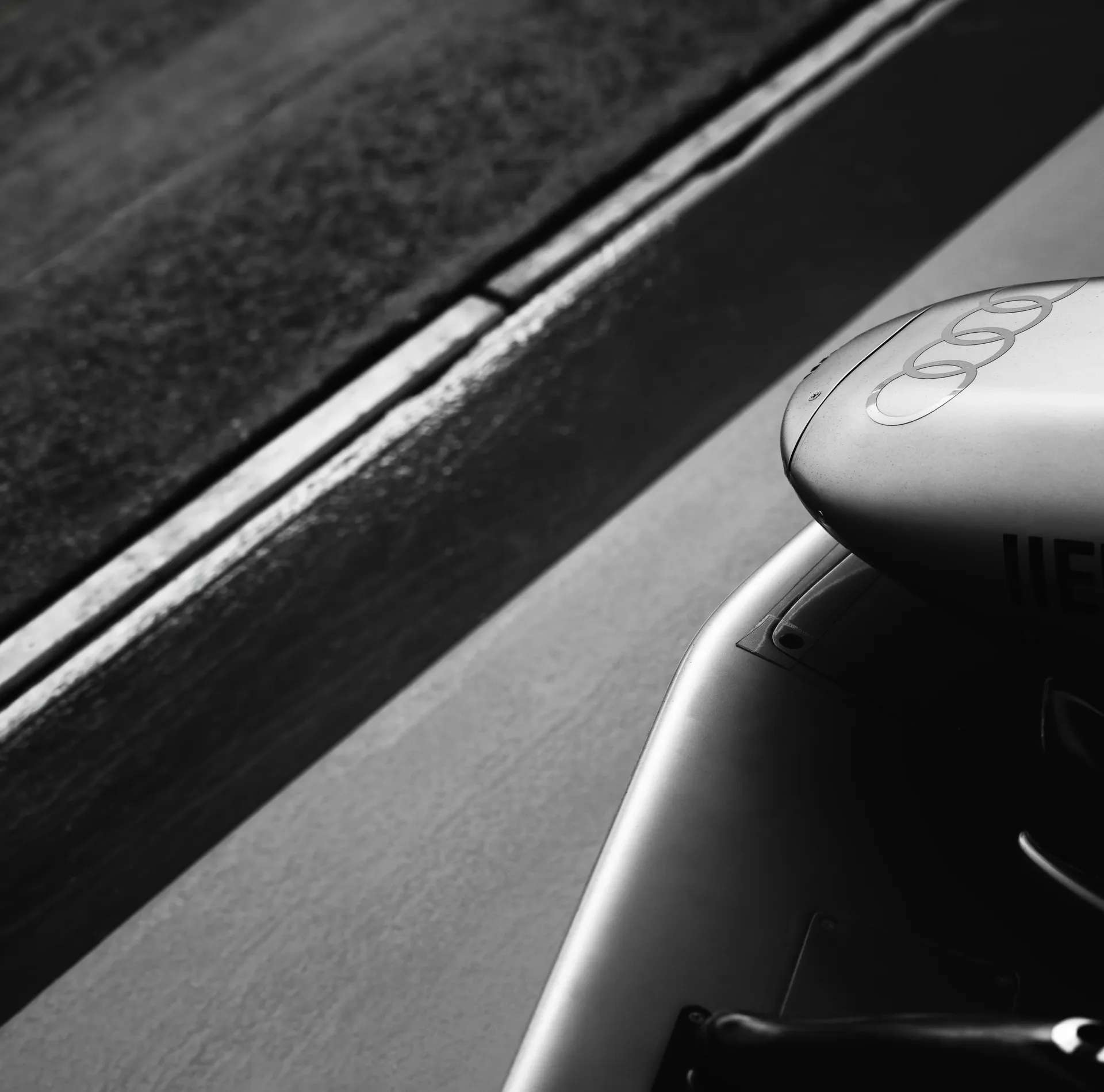 Black and white front wing Close up Audi Revolut F1® Team car at the pitstop lane